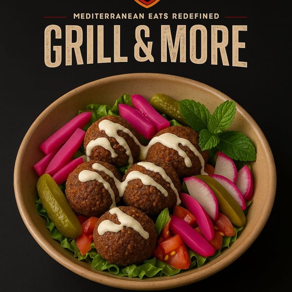 A bowl of falafel with tahini, lettuce, tomatoes, pickles, radishes, and mint from Grill & More.